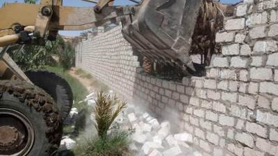 أجهزة الرى تواصل العمل أثناء أجازة العيد لإزالة التعديات على المجارى المائية